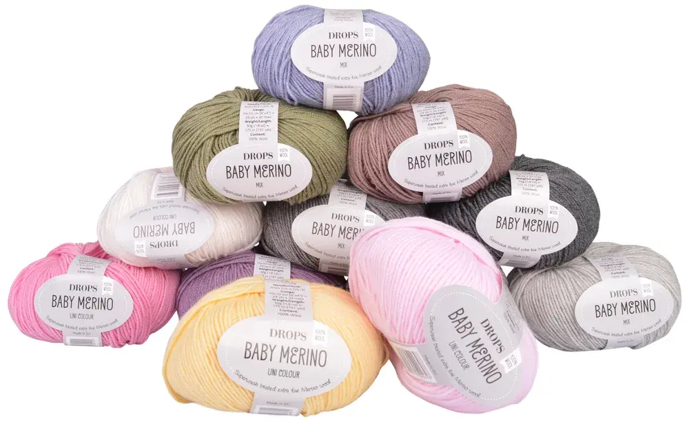 Drops Baby Merino-nøster med etikett i pastellfarger, grått, olivengrønt og gult
